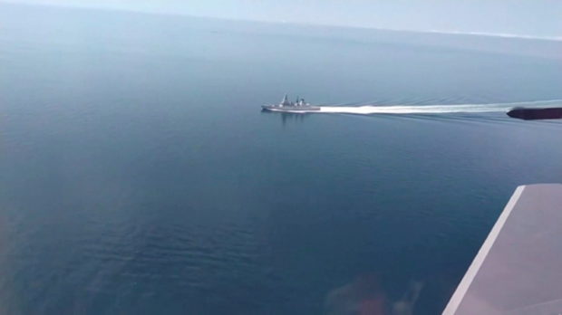A still image taken from a video released by Russia's Defence Ministry allegedly shows British Royal Navy's Type 45 destroyer HMS Defender filmed from a Russian military aircraft in the Black Sea, June 23, 2021. Ministry of Defence of the Russian Federation/Handout via REUTERS