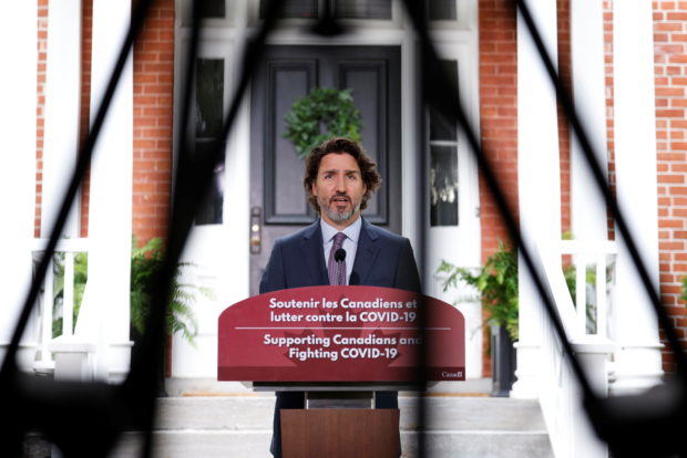 Canada's Prime Minister Justin Trudeau attends a news conference at Rideau Cottage during which, amongst other topics, he spoke about unmarked graves found recently, as efforts continue to help slow the spread of the coronavirus disease (COVID-19), in Ottawa, Ontario, Canada June 25, 2021. REUTERS/Blair Gable
