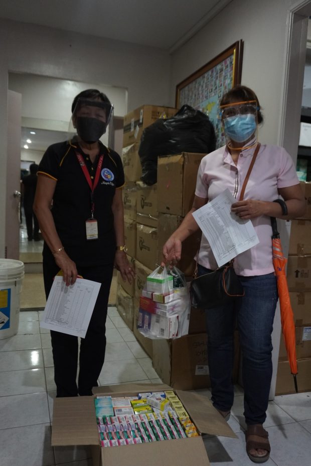 Angeles City, Pampanga government officer turns over medicines to Barangay Cutcut sub-health center