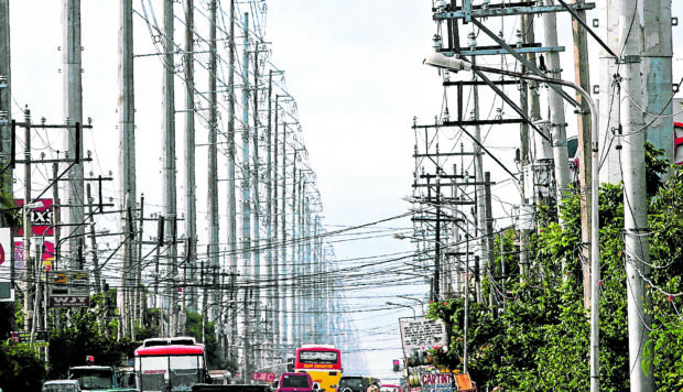 High-voltage power transmission lines. STORY: Fix to unsightly transmission lines sought