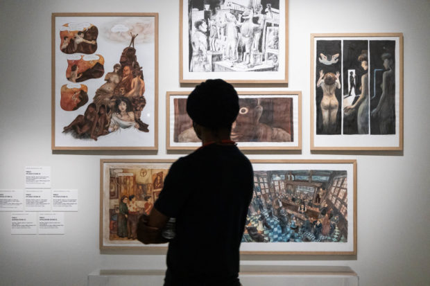 A man visits the exhibition "Picasso et la bande dessinee" (Picasso and comics) at the Cité Internationale de la bande dessinee et de l’image in Angouleme on June 15, 2021. 