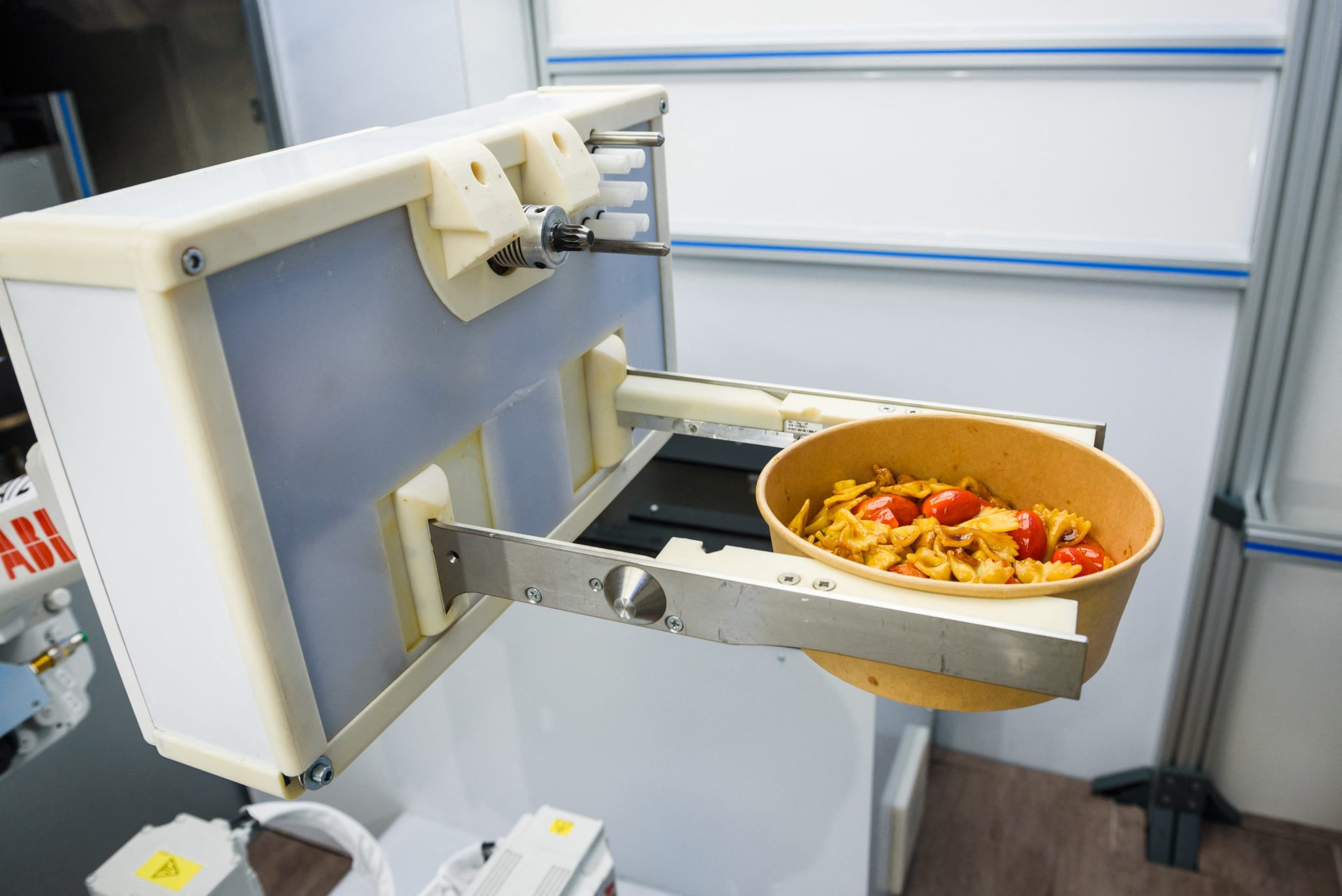 Kitchen robot in Riga cooks up new future for fast food | Inquirer News