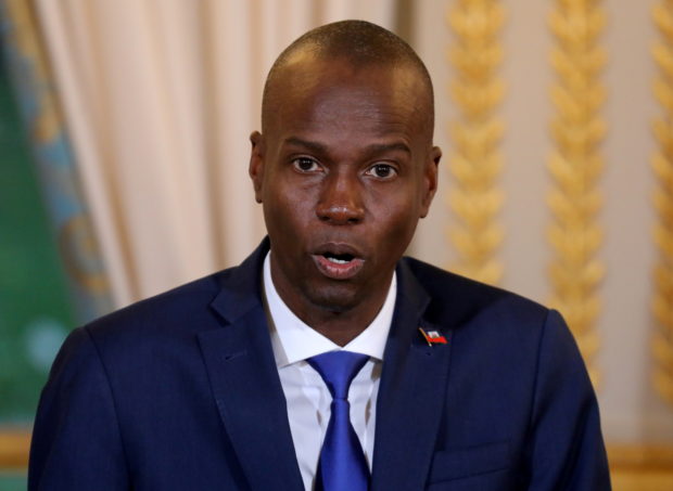 Haitian President Moise Jovenel speaks during a press conference