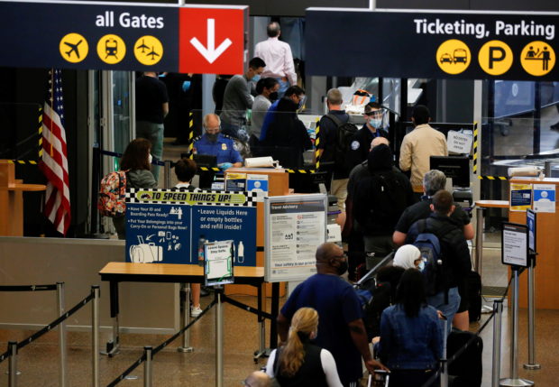 United States will not immediately lift travel restrictions, says White House exec