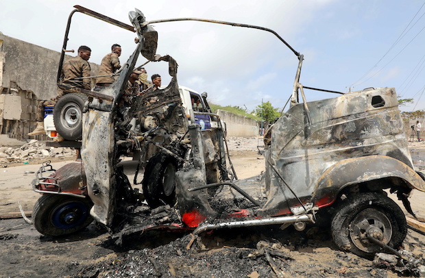 A wreckage of a rickshaw is seen at the scene of a car explosion near Banadir hospital in Mogadishu