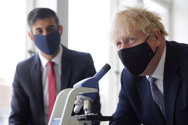 Britain's PM Johnson and Chancellor of the Exchequer Sunak visit school in London
