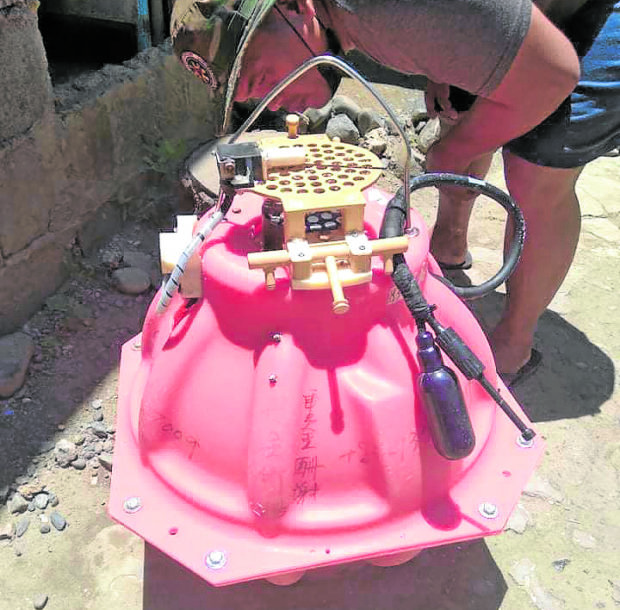 UNUSUAL FIND Fishermen found an ocean bottom seismometer, or OBS, in a recent trip to the West Philippine Sea, about 239 kilometers northwest of Infanta, Pangasinan. The equipment, bearing Chinese characters and used in oil exploration, was recovered within the country’s exclusive economic zone.