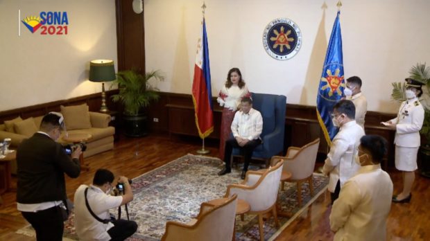 President Duterte’s together with his partner Honeylet Avanceña posing for the camera. 