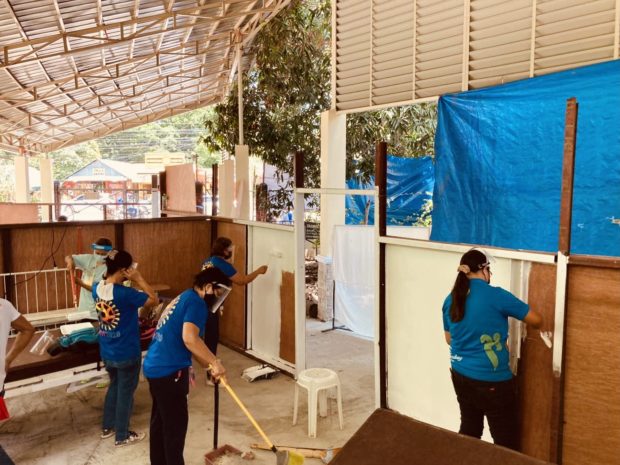 Health workers in Ilocos Norte volunteer to build a makeshift facility in Mariano Marcos Memorial Hospital and Medical Center