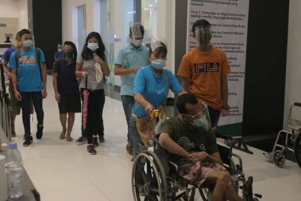 The Olongapo City government has started vaccinating against COVID-19 persons with disabilities (PWDs). About 20 slots were given to inoculate the first batch of PWDs during the recent rollout of Sinovac vaccines at the SMX Convention Center of SM Olongapo Central (Photo courtesy of Olongapo City Information Center)  