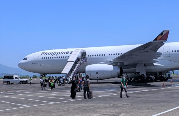 Repatriated overseas Filipino workers from Saudi Arabia arrive at the Subic Bay International Airport via a Philippine Airlines flight