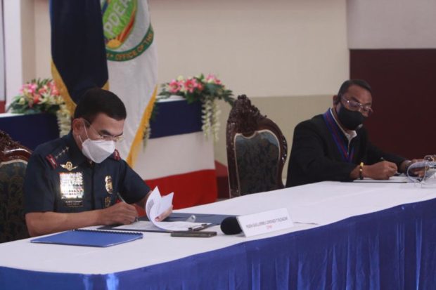 PNP chief Guillermo Eleazar and PDEA Director Wilkins Villanueva signed the unified agreement during a ceremony in Camp Crame in Quezon City to avert future misencounters between the two law enforcement agencies. Photo courtesy of PNP-PIO.