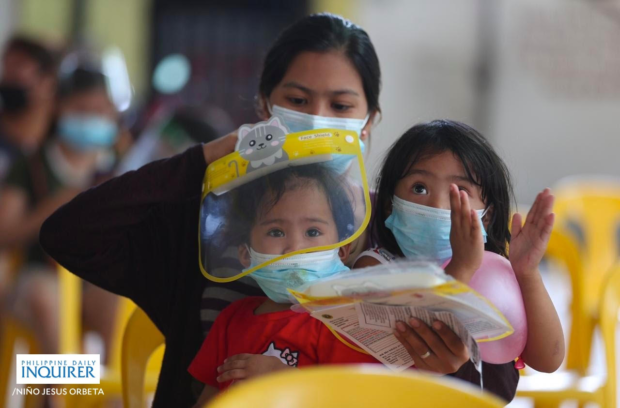 The challenge for parents to keep their children safe has grown during the pandemic. NIÑO JESUS ORBETA/FILE PHOTO/INQUIRER mother women children COVID-19