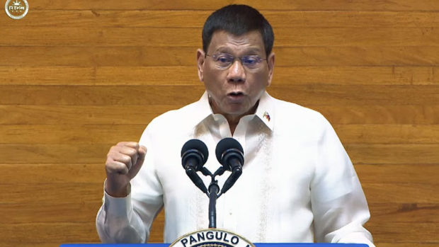 President Rodrigo Duterte makes a closed fist gesture during his final Sona. Screenshot from RTVM youtube live