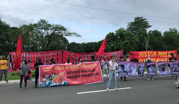 Protesters gathered at the UP-Diliman in Quezon City hours before President Rodrigo Duterte delivers his final Sona on Monday.