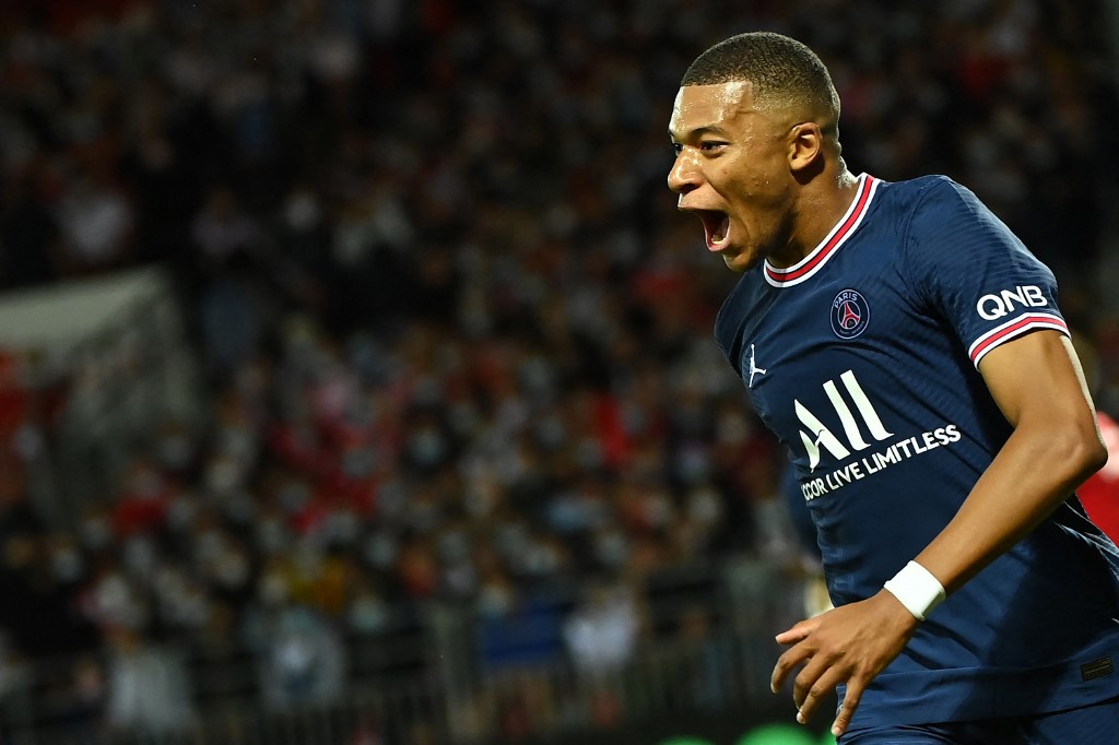 Paris Saint-Germain's French forward Kylian Mbappe celebrates after scoring a goal during the French L1 football match between Stade Brestois and Paris Saint-Germain at Francis-Le Ble Stadium in Brest on August 20, 2021. 