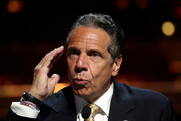 New York Governor Andrew Cuomo speaks at news conference from the stage at Radio City Music Hall in New York