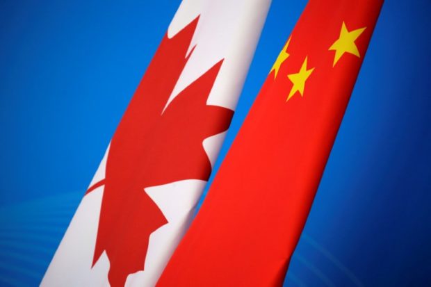 Flags of Canada and China are placed for the first China-Canada economic and financial strategy dialogue in Beijing