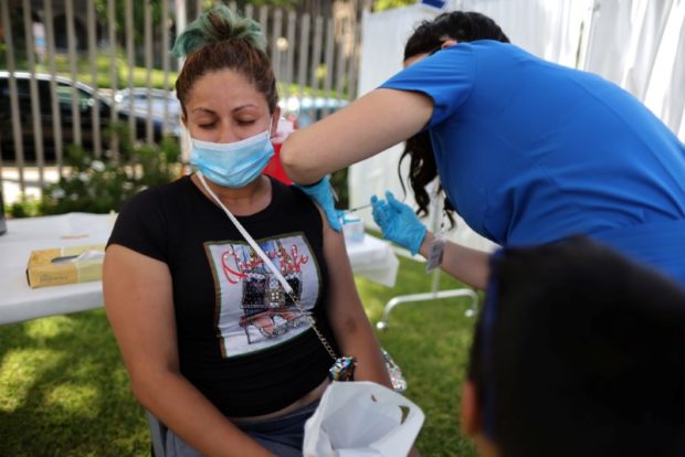  Rosa Gallegos, 31, attends a coronavirus disease (COVID-19) vaccination clinic in Los Angeles, California, U.S., August 11, 2021. REUTERS/Lucy Nicholson
