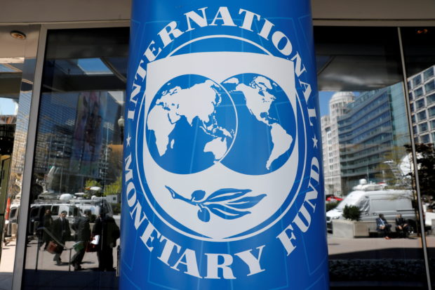 International Monetary Fund logo is seen outside its headquarters during the IMF/World Bank spring meetings in Washington, U.S., April 20, 2018. REUTERS/Yuri Gripas