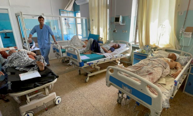 Exhausted Kabul hospital staff fear more attacks may come
