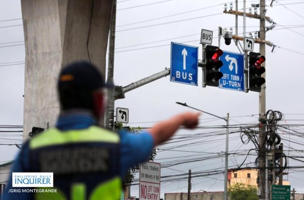 A Metro Manila Development Authority (MMDA) traffic enforcer. STORY: MMDA workers allowed heat break for 2 months