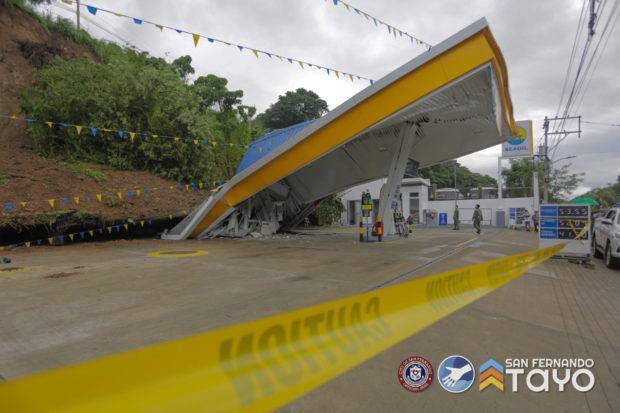Damaged gas station on a diversion road at Barangay Sevilla in San Fernando City, La Union