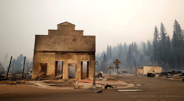 The main thoroughfare in a historic California gold-rush town was in smoldering ruins, officials said on Thursday, hours after the state's largest wildfire engulfed the hamlet in the Sierra Nevada Mountains.