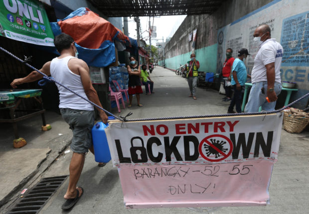 Metro Manila and the provinces of Laguna and Bataan will be placed under a less restrictive modified enhanced community quarantine (MECQ) for the rest of August, Malacañang said Thursday night. 