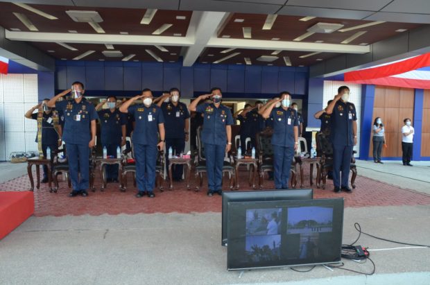 Officials of the Police Regional Office 3 salute the Philippine flag during the recent 2021 Independence Day celebration