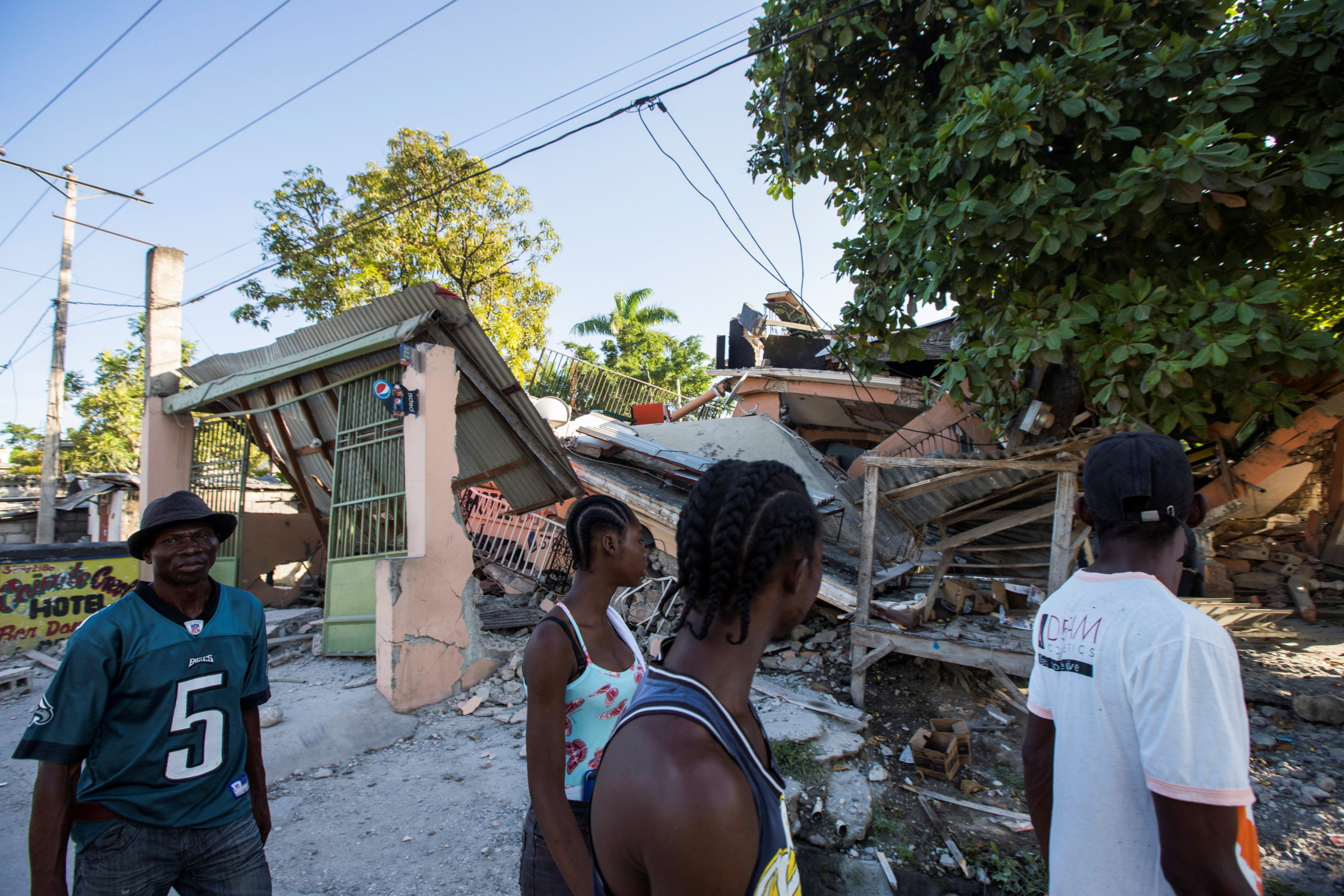 Rescuers race to find Haiti quake survivors as death toll hits 1,297