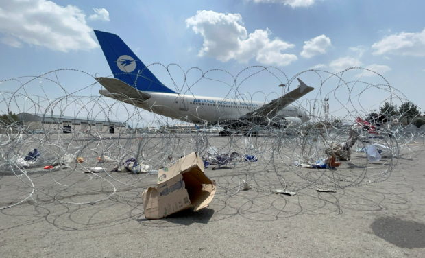 A commercial airplane is seen at the Hamid Karzai International Airport a day after U.S troops withdrawal in Kabul, Afghanistan August 31, 2021. 
