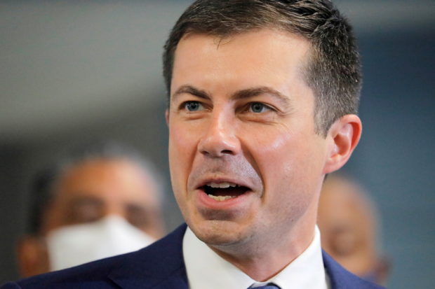 FILE PHOTO: U.S. Transportation Secretary Pete Buttigieg delivers remarks during a funding announcement for the Gateway Tunnel project in New York City