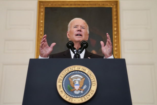 U.S. President Joe Biden delivers remarks on the Delta variant and his administration's efforts to increase vaccinations, from the State Dining Room of the White House in Washington, U.S., September 9, 2021. 