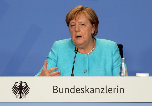 FILE PHOTO: German Chancellor Merkel attends a news conference