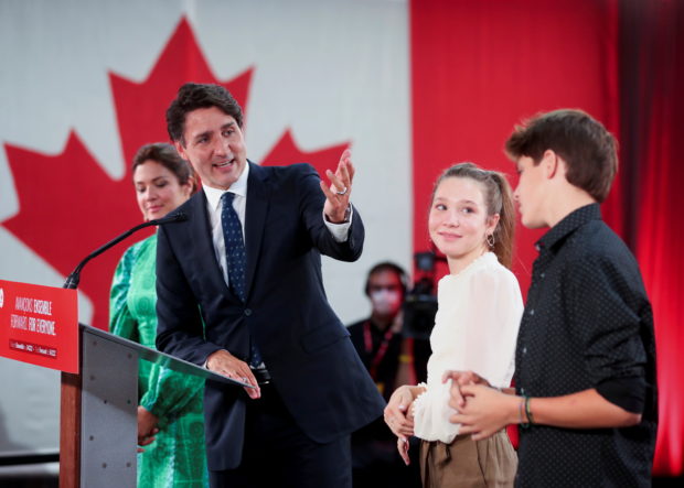 Canada's Liberal Prime Minister Justin Trudeau, accompanied by his wife Sophie Gregoire thanks their children Ella-Grace and Xavier during the Liberal election night party in Montreal, Quebec, Canada, September 21, 2021. 