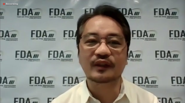 Photo: FDA Director-General Eric Domingo presents data on adverse events following immunization during a virtual media forum on Thursday. Photo courtesy: screenshot from media forum