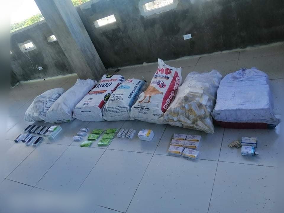 The sacks of antibiotics and other drugs seized from the suspect