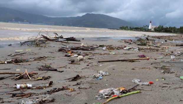 Typhoon debris and garbage are found along the coastline of Subic Bay Freeport
