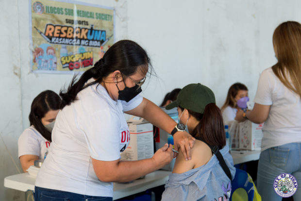 A resident in the Ilocos region receives a COVID-19 vaccine in a facility in Vigan City, Ilocos Sur. (Photo courtesy of the Vigan city government)