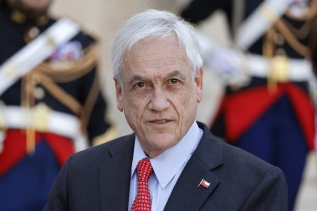 (FILES) In this file photo taken on September 6, 2021 Chilean President Sebastian Pinera looks on after a meeting with French President (unseen) at the Elysee presidential Palace in Paris. - An investigation based on one of the biggest ever leaks of financial documents on October 3, 2021 exposed a hidden world of shielded wealth belonging to hundreds of politicians and billionaires, including Pinera, who denied having any link with the sale of the Minera Dominga company by the Pinera-Morel family company, as indicated by the investigation. One of the largest ever global media investigations, the "Pandora Papers" involved more than 600 journalists who together analyzed some 11.9 million documents from financial services companies around the world. In most countries, the ICIJ stresses, it is not illegal to have assets offshore or to use shell companies to do business across national borders. (Photo by Ludovic MARIN / AFP)