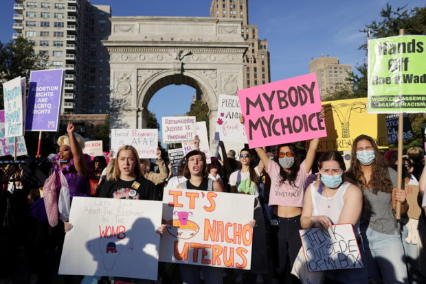 Supporters of reproductive choice take part in the nationwide Women's March, held after Texas rolled out a near-total ban on abortion procedures and access to abortion-inducing medications, in New York City, New York, U.S. October 2, 2021. 