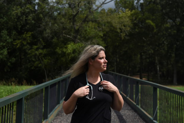 Jennifer Bridges, 39, an RN who was fired from her job after refusing the coronavirus disease (COVID-19) vaccine, poses for a portrait at Jenkins Park in Baytown, Texas, U.S., September 30, 2021. Picture taken September 30, 2021.  REUTERS/Callaghan O'Hare
