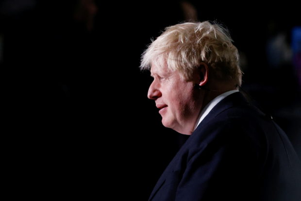 Conservative Party Conference in Manchester; FILE PHOTO: Britain's Prime Minister Boris Johnson takes part in media interviews during the annual Conservative Party conference, in Manchester, Britain, October 5, 2021. REUTERS/Phil Noble/File Photo