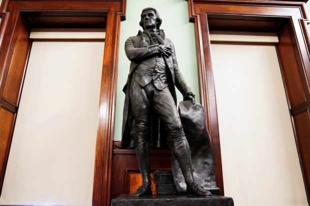 A statue of former U.S. President Thomas Jefferson is pictured in the council chambers in City Hall after a vote to have it removed in the Manhattan borough of New York City, New York, U.S., October 19, 2021.  REUTERS/Carlo Allegri