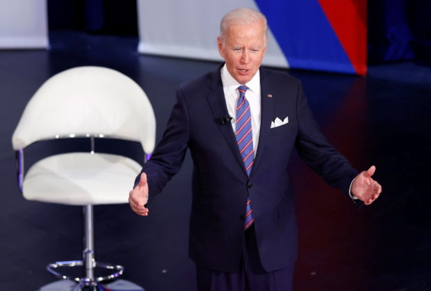 U.S. President Joe Biden participates in a town hall about his infrastructure investment proposals with CNN's Anderson Cooper (unseen) at the Baltimore Center Stage Pearlstone Theater in Baltimore, Maryland, U.S. October 21, 2021. REUTERS/Jonathan Ernst