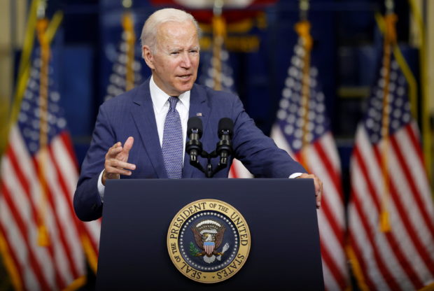 FILE PHOTO: U.S. President Joe Biden delivers remarks on his Build Back Better infrastructure agenda at the NJ TRANSIT Meadowlands Maintenance Complex in Kearny, New Jersey, U.S., October 25, 2021. REUTERS/Jonathan Ernst/File Photo