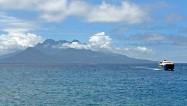 A ferry leaves the volcanic island of Camiguin, Northern Mindanao’s key tourism destination