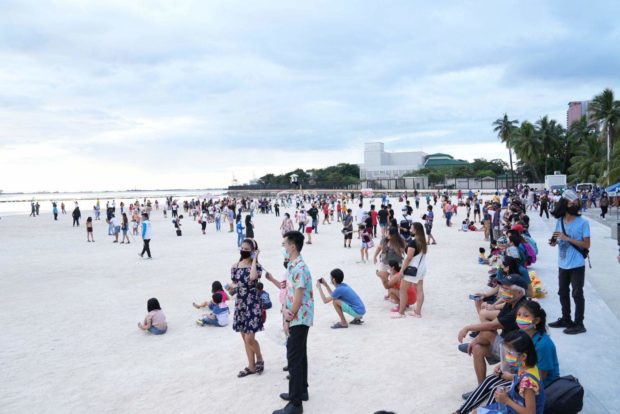 The Manila Bay dolomite beach reopened to the public on Tuesday, but for people planning to visit the artificial white beach should first register online to avoid overcrowding in the area, according to the Department of Environment and Natural Resources (DENR).