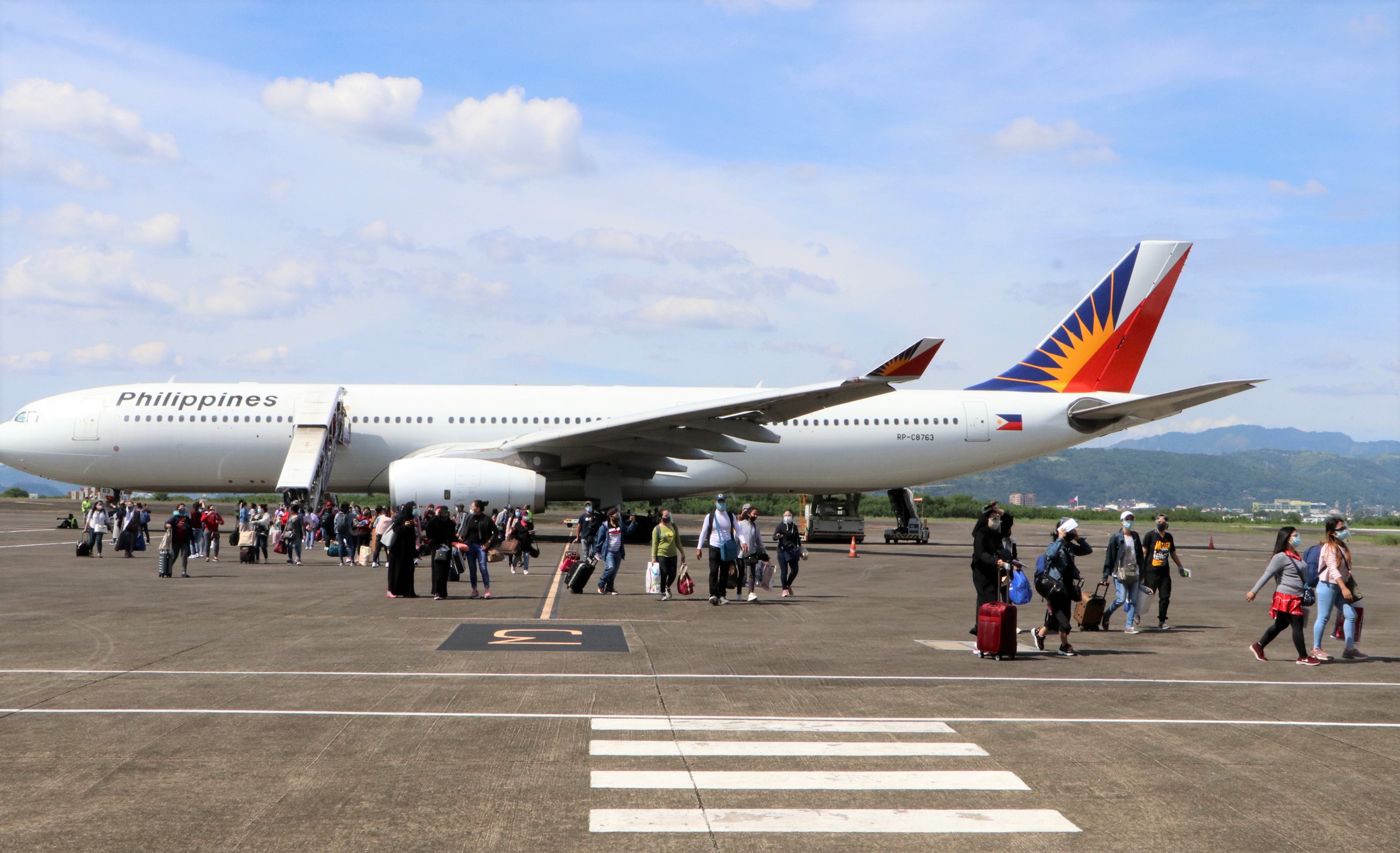 OFW flights from Abu Dhabi arrive at the Subic Bay International Airport
